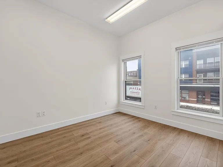 116 E 3rd St — Photo 12