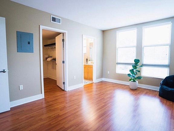 large first level bedroom with private bathroom