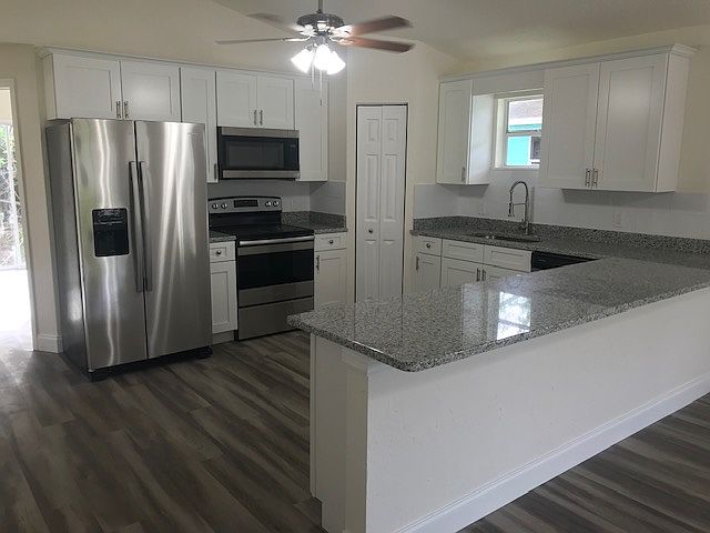 Open concept kitchen with bar