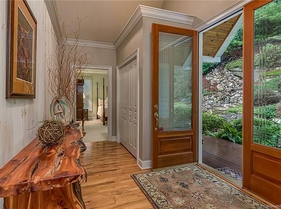 Waterfall by front entry has programmable lighting.