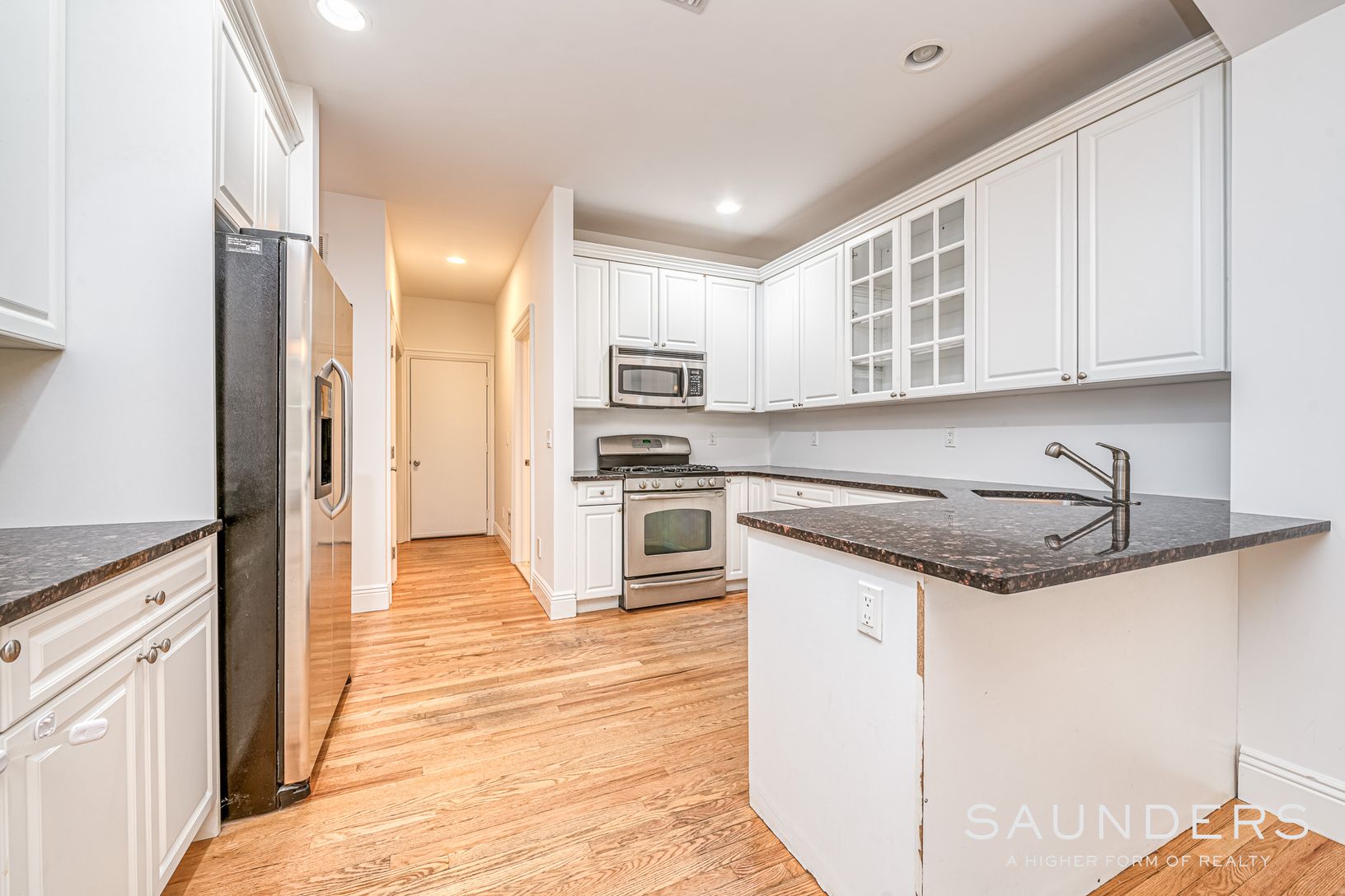  Granite counter tops, stainless steel appliances lots of cabinets in the kitchen