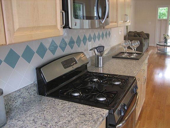 Granite and Custom Tile in Kitchen