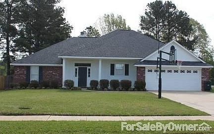 Front of house
						:
						Great street - and an adjustable in ground basketball goal.