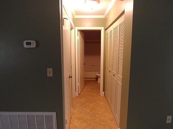 Hall to guest bathroom & bedrm