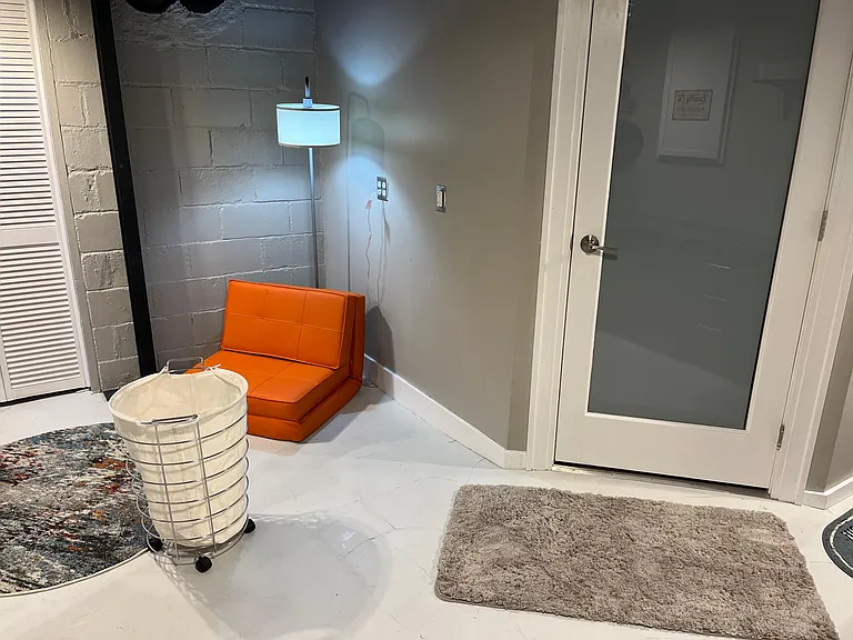 Basement can be a great hang out waiting for your laundry or the two person bath. Note the laundry basket to catch laundry from second floor or kitchen.
