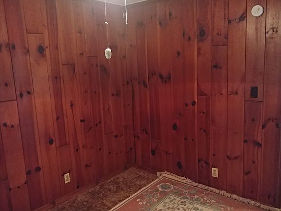 Den or extra bedroom if closedin