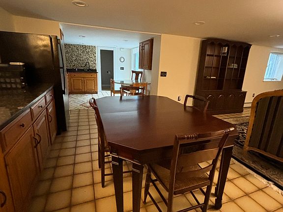 View of Kitchen from Dining Area, Facing door into bathroom