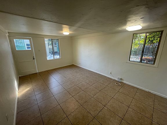Living room and front door.
