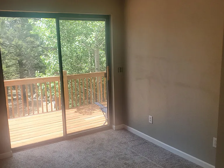 Third bedroom door to deck.
