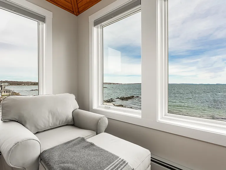 The third floor master bedroom with a king bed. Panoramic ocean views.