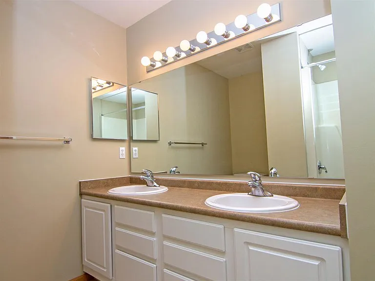 Spacious vanities with ample storage make it easy to stay organized while adding a touch of modern convenience.