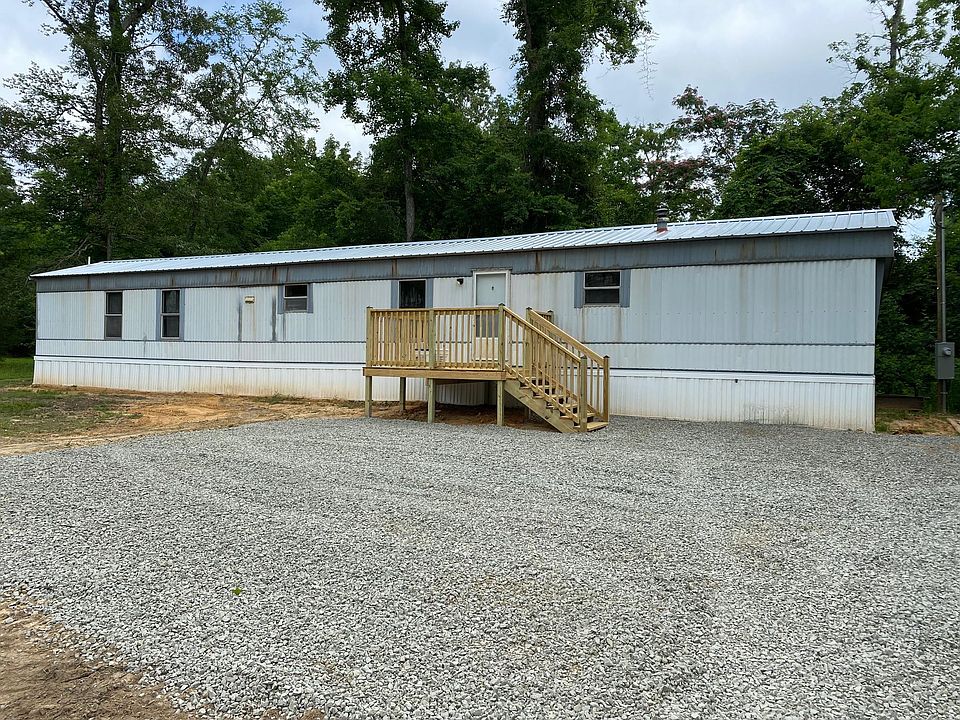 Front entrance with newly built deck and nice parking for 2 vehicles