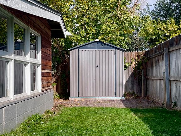 Cute extra storage shed.