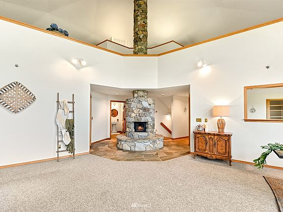 Enviable geometry offers an experience like no other. This Russian Fireplace is a legendary centerpiece that spans all 3 levels. >