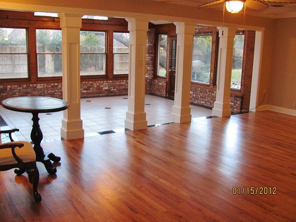 Solid Oak Den floor looking out to sunroom