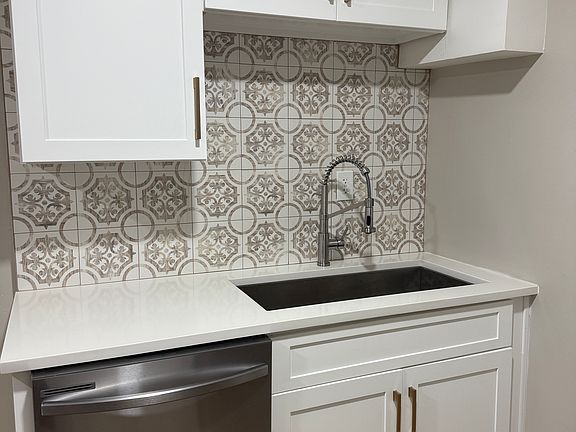 Kitchen 
Quartz countertops and soft close cabinets