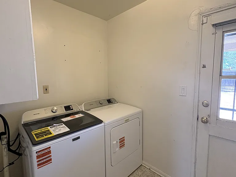 Laundry room with washer and dryer