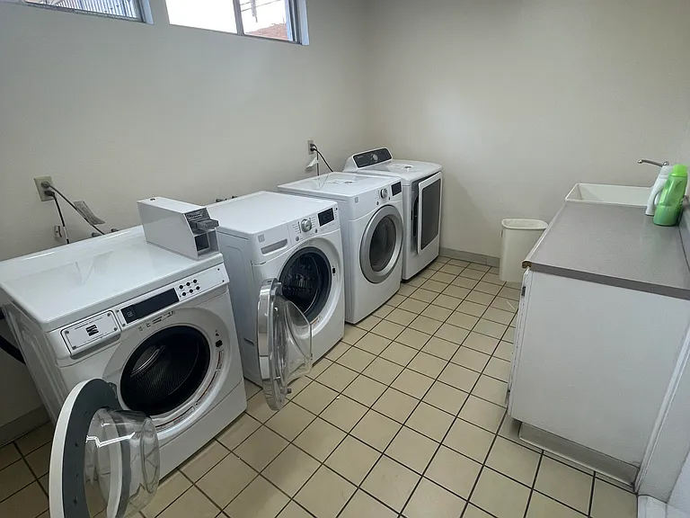 Laundry room (it is 10 feet from the condo; 2 washers and 2 dryers per floor _ all free)