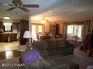Living room kitchen dining room to sunro