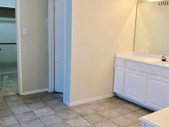 Master bath with large walk in closet and double vanity!