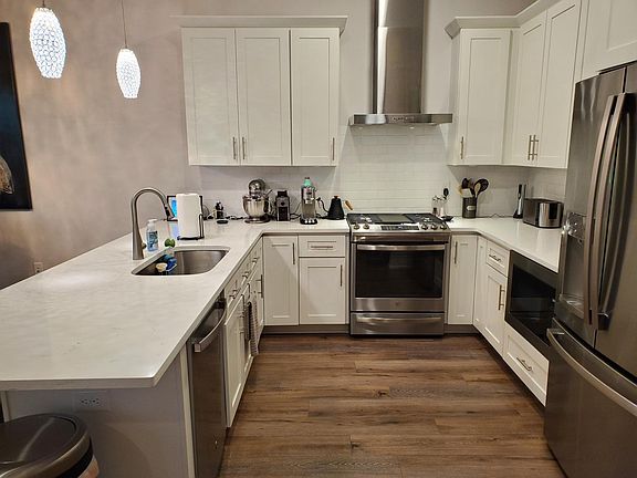 Kitchen with stainless steel appliances and gas cooking
