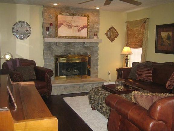 Family room w/dramatic stone fireplace