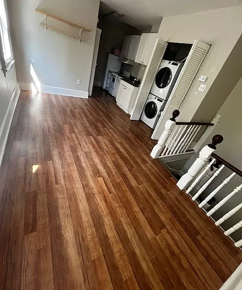 living room/dining room area with washer/dryer