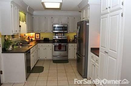white Kitchen w plenty of cabinets!