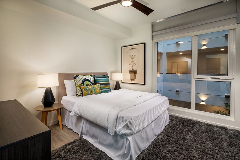 Picasso Apartments Bedroom area with window and view