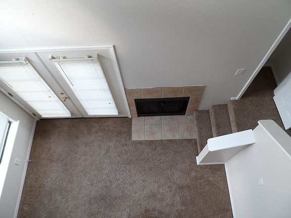 Positioned from Loft peering onto living area