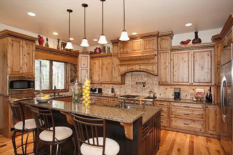 Gourmet kitchen is a chef's dream - stunning custom cabinets