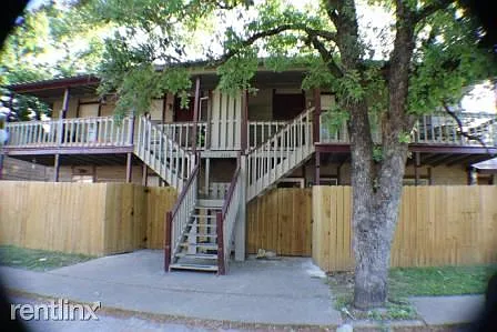 2410 Bosque back entrance. Lots of parking and shade. Newl
