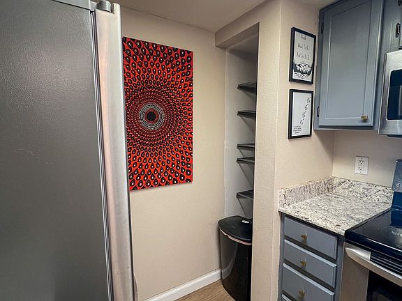 Built-in pantry with shelves to hold your food.