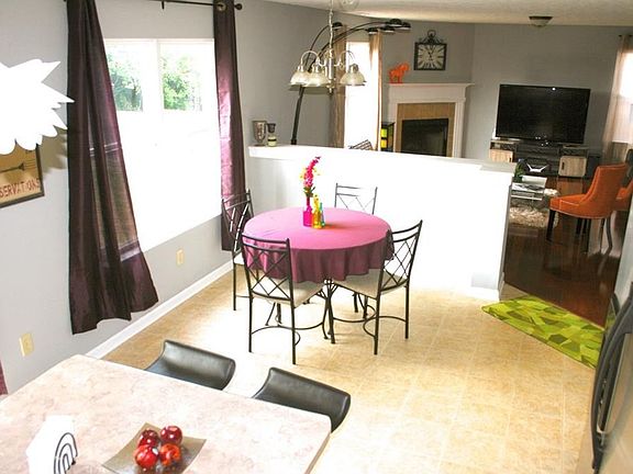 Bright and cheery kitchen has a good-sized eat-in kitchen.