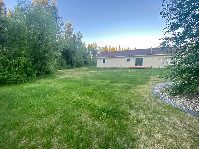 Large back yard with a fire pit!