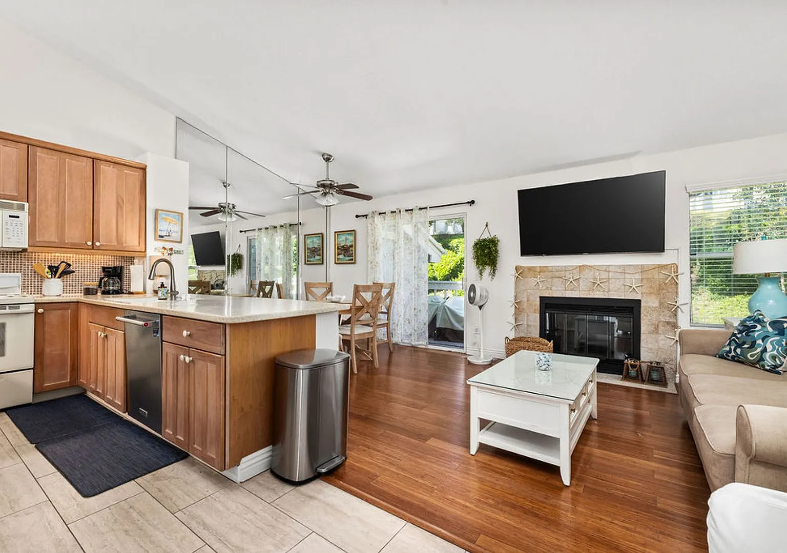 Serene Furnished 1/1 Top-Floor Coastal Condo with Balcony and Covered Parking — Photo 1