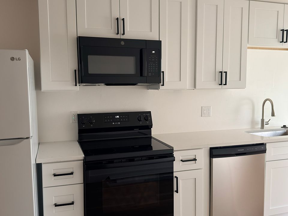 Bright, updated kitchen with brand new cabinets and appliances