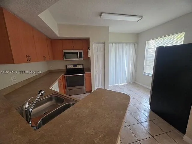 6942 W Sample Rd — Photo 3