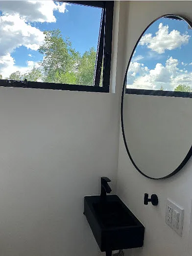 Salvador Dali-esk half bathroom off pantry area.