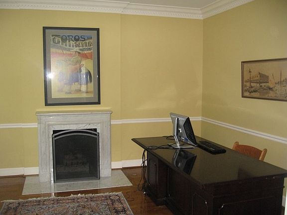 Formal Living Room/Library   with built-in bookshelves and fireplace 