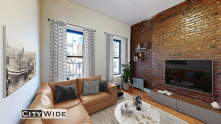 1st image of 407 W 50th St APT 15