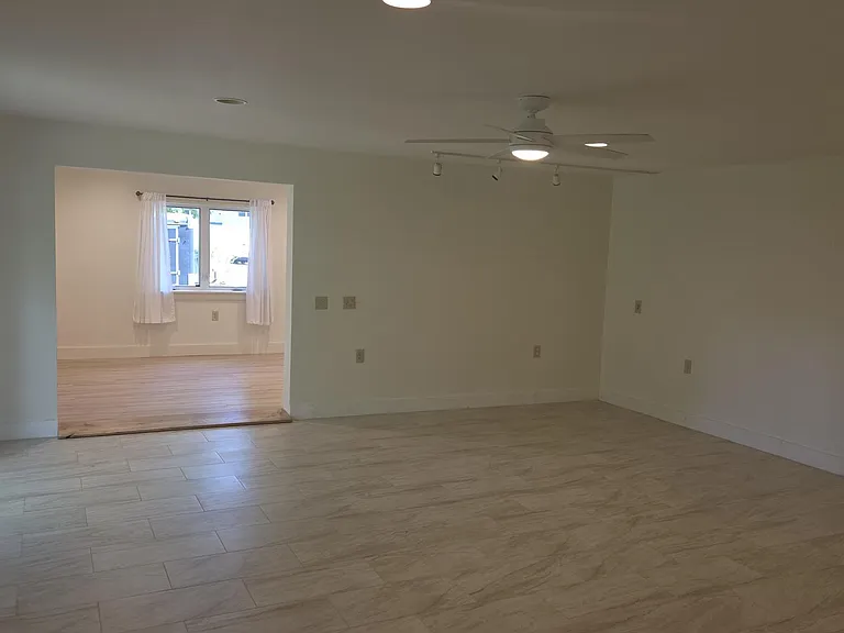 View Into Living Room And New Office Or Library Space. Living Room Has New Tiled Flooring, And Radiant Floor Heat!