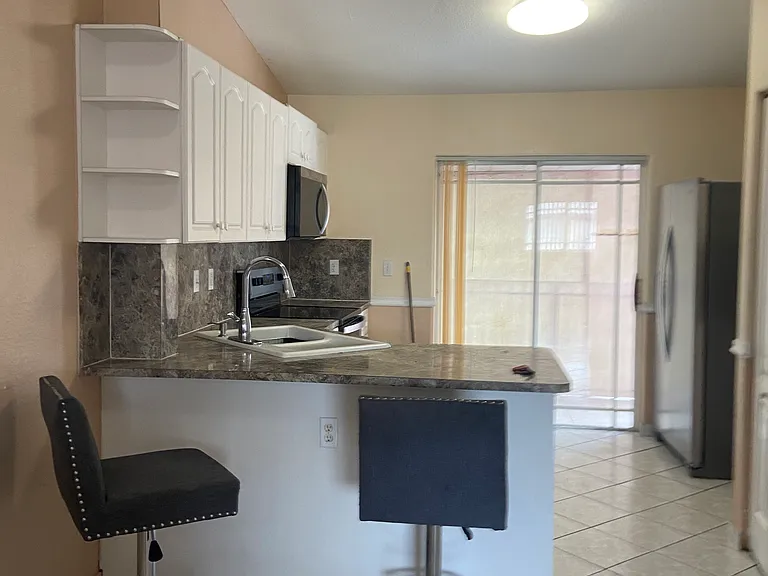 10925 W Okeechobee Rd #202 — Photo 2