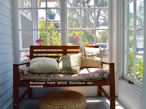 Cozy enclosed front porch