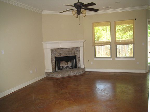 Brick fireplace gives a rustic feel to this home.