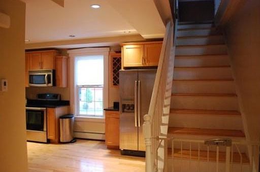 Kitchen (stairs lead to bedrooms and bath)
