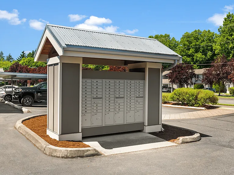 Secure, convenient mailbox station with covered access.