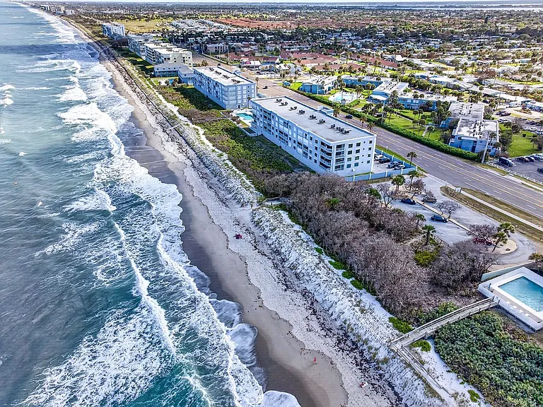 Drone view - looking West (complex is situated on the the west side of A1A and a few hundred feet from the breaking waves).
