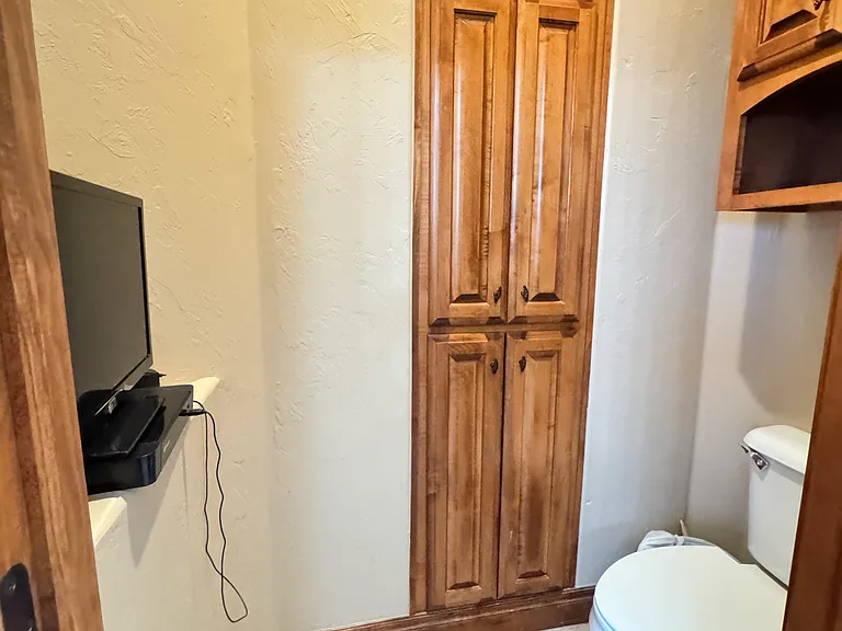 Toilet with build- in connection for TV