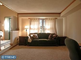 Living room with fresh paint and newer carpet